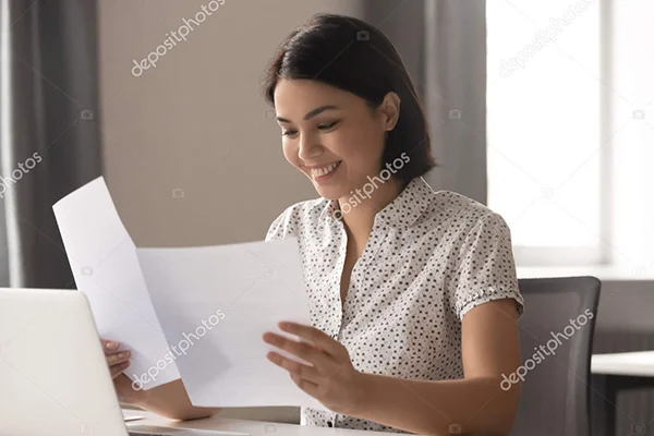 Satisfied Customer Looking At Home Inspection Report
